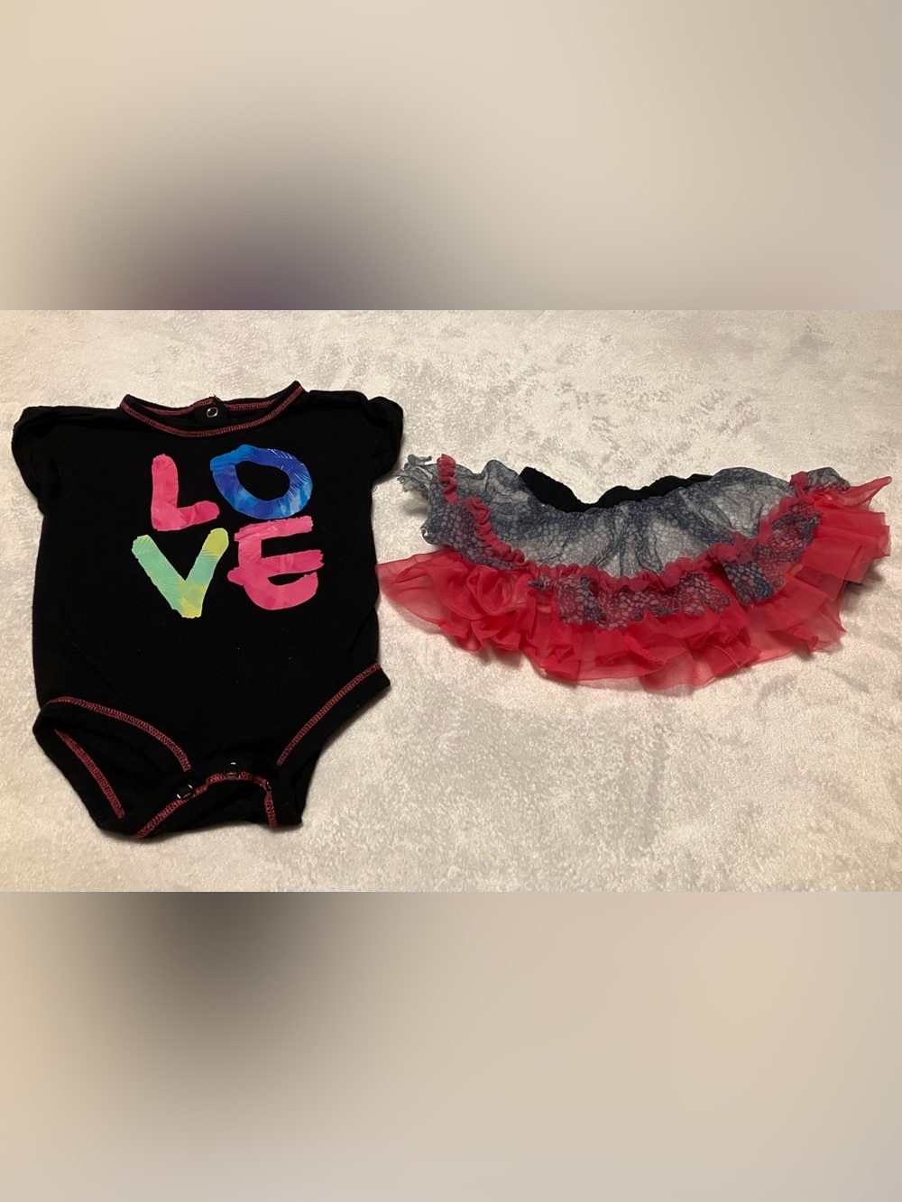Black Bodysuit with Colorful LOVE Print and Pink Ruffle Skirt